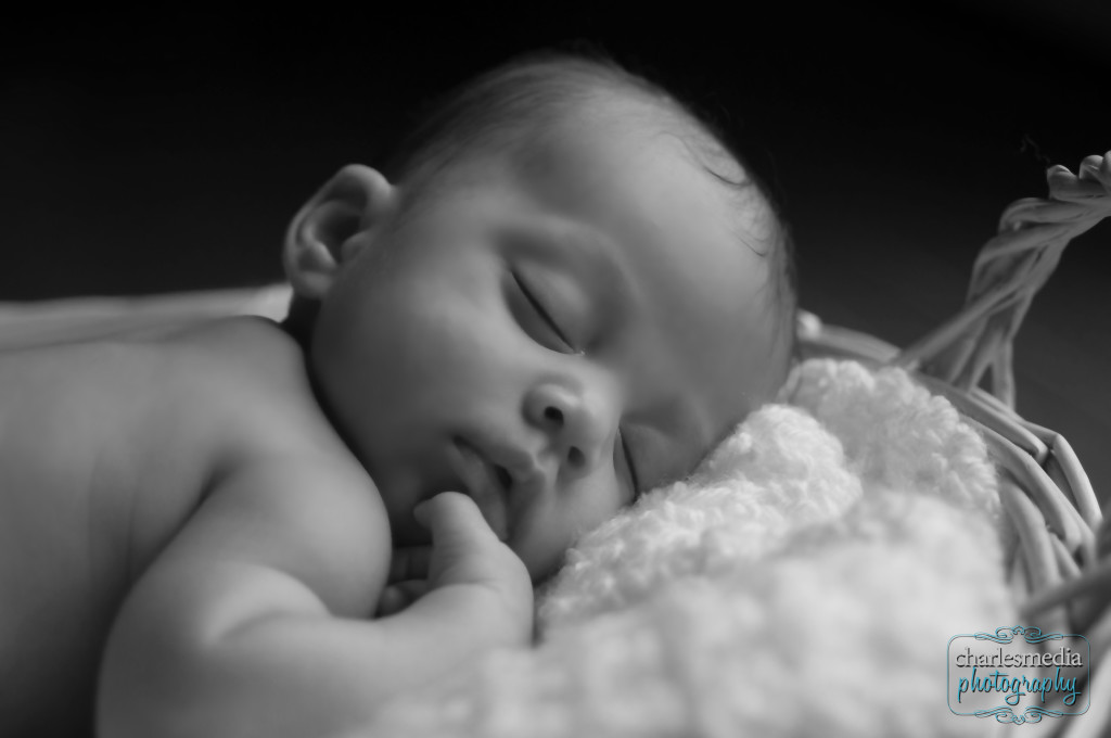 Newborn Portrait Photography, black and white image of baby girl sleeping
