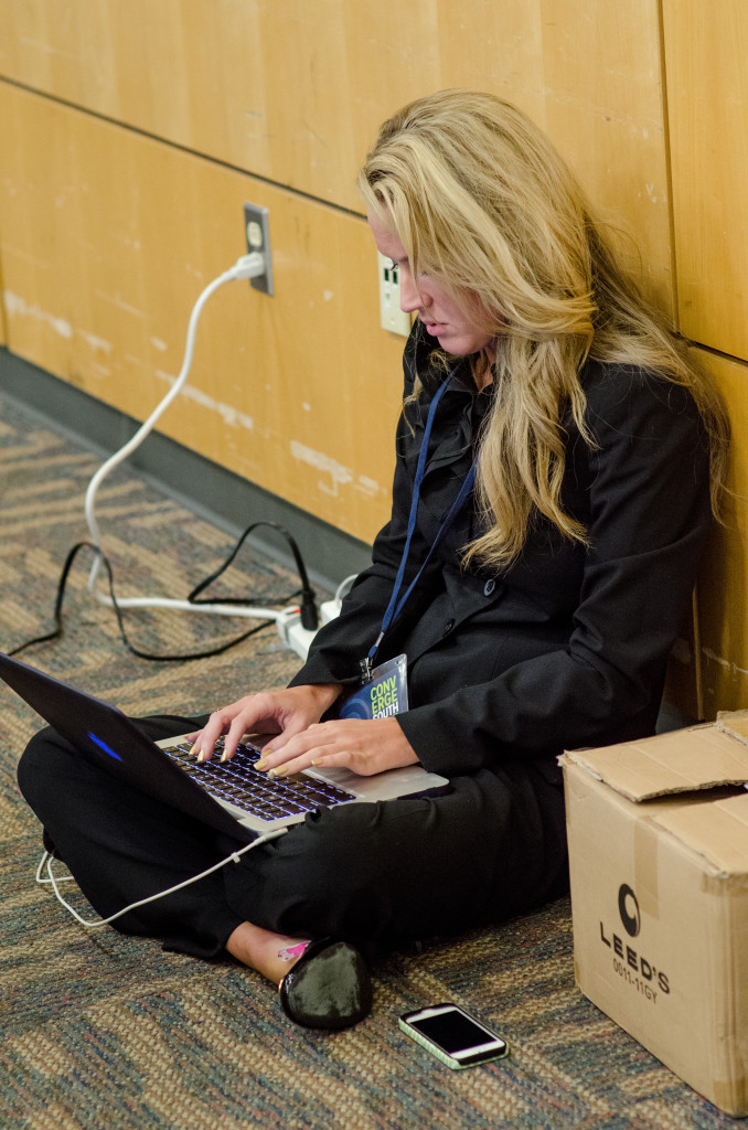 ConvergeSouth 2013 laptop user seated, Elliott University Center, UNCG